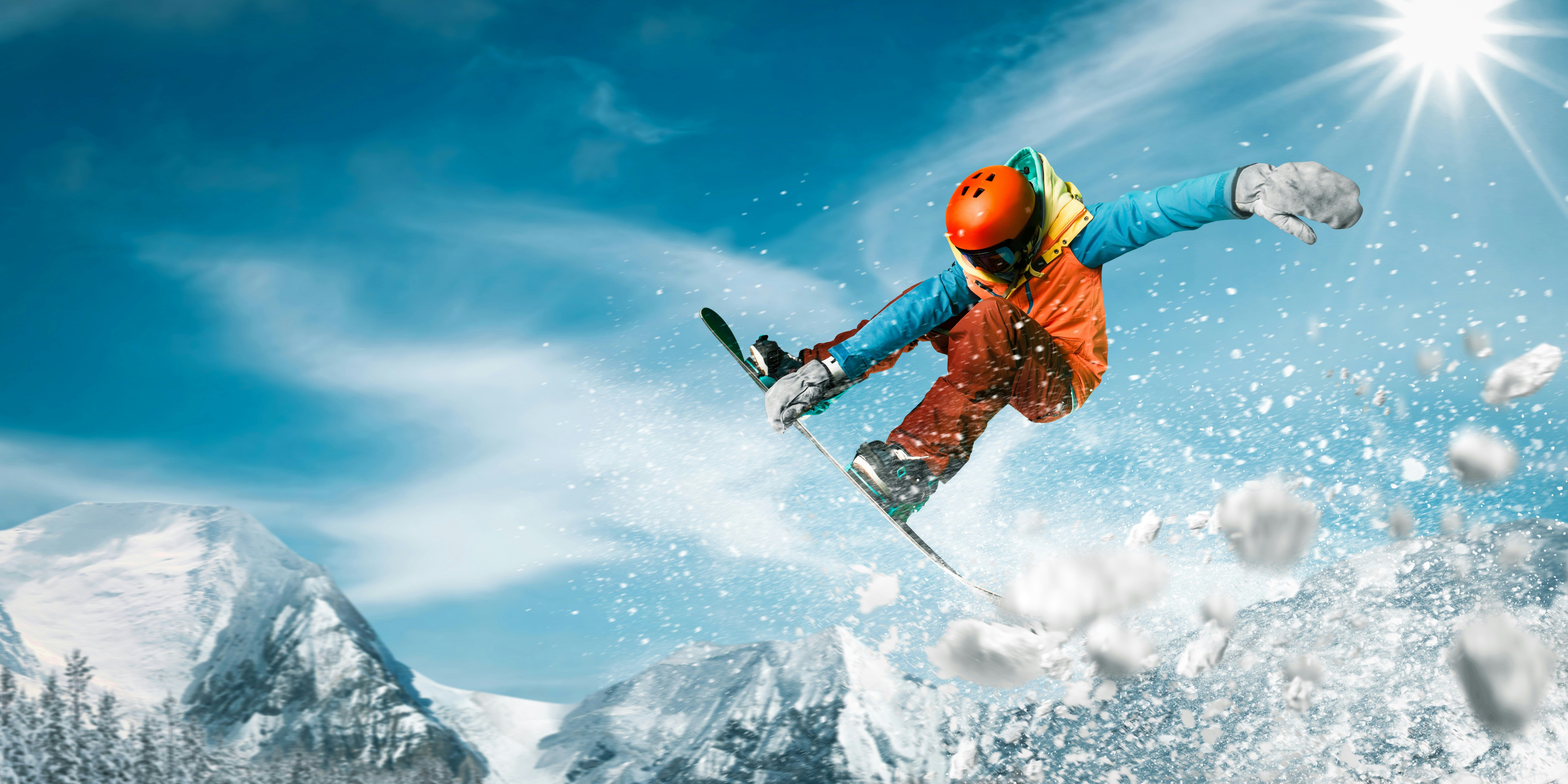 A jumping snowboarder