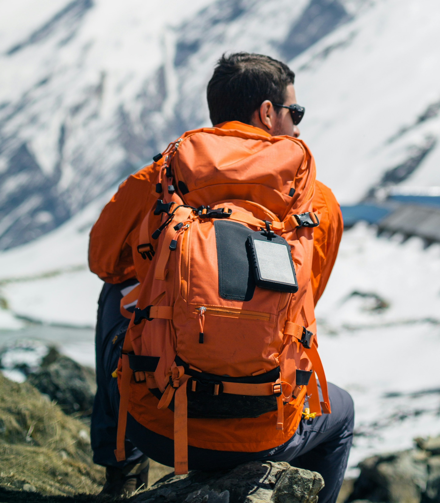 Mountain guide checking in the Alps
